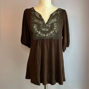 Dark brown crocheted lace bib front elbow puff sleeve top